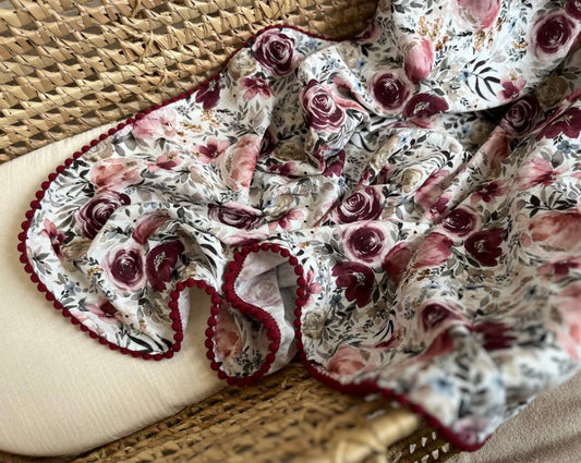 floral muslin baby pom pom swaddle blanket