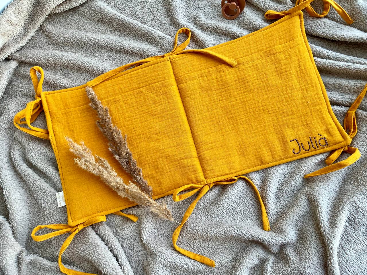 Baby bed pocket with ties from organic muslin Mustard