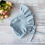 Muslin baby summer bonnet with ruffle and ties - lavender