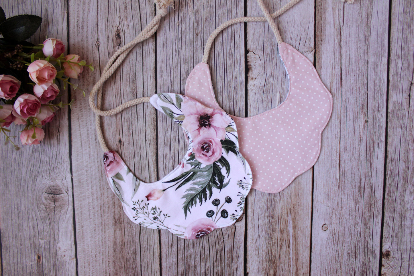 Boho baby bib - pink and beige flowers on a brown background