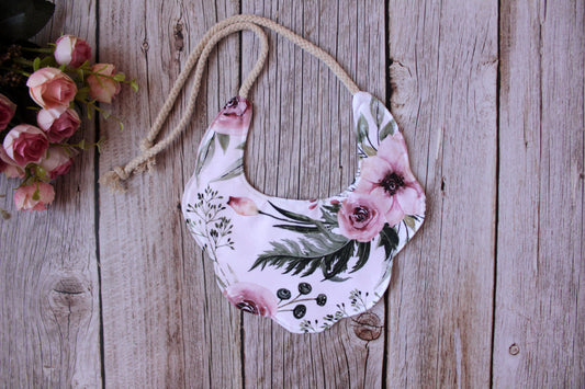 Boho baby bib - pink and beige flowers on a brown background