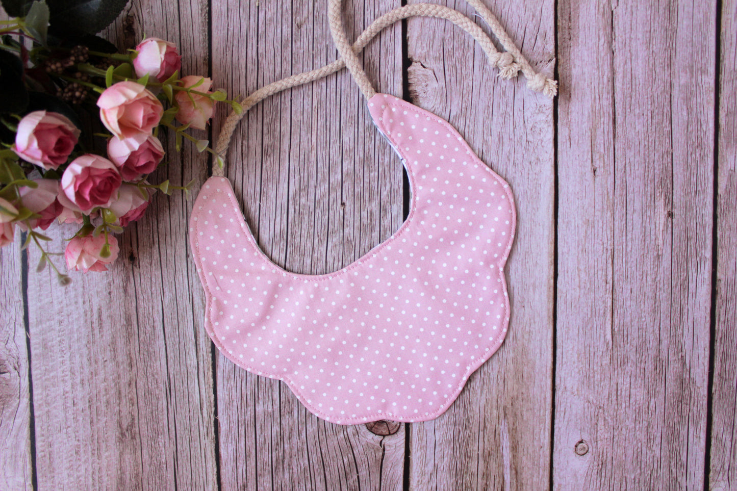 Boho baby bib - pink and beige flowers on a brown background