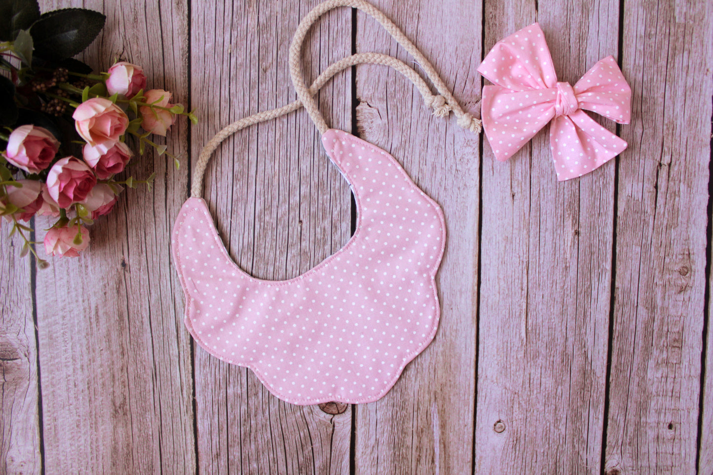 Boho baby bib - pink and beige flowers on a brown background