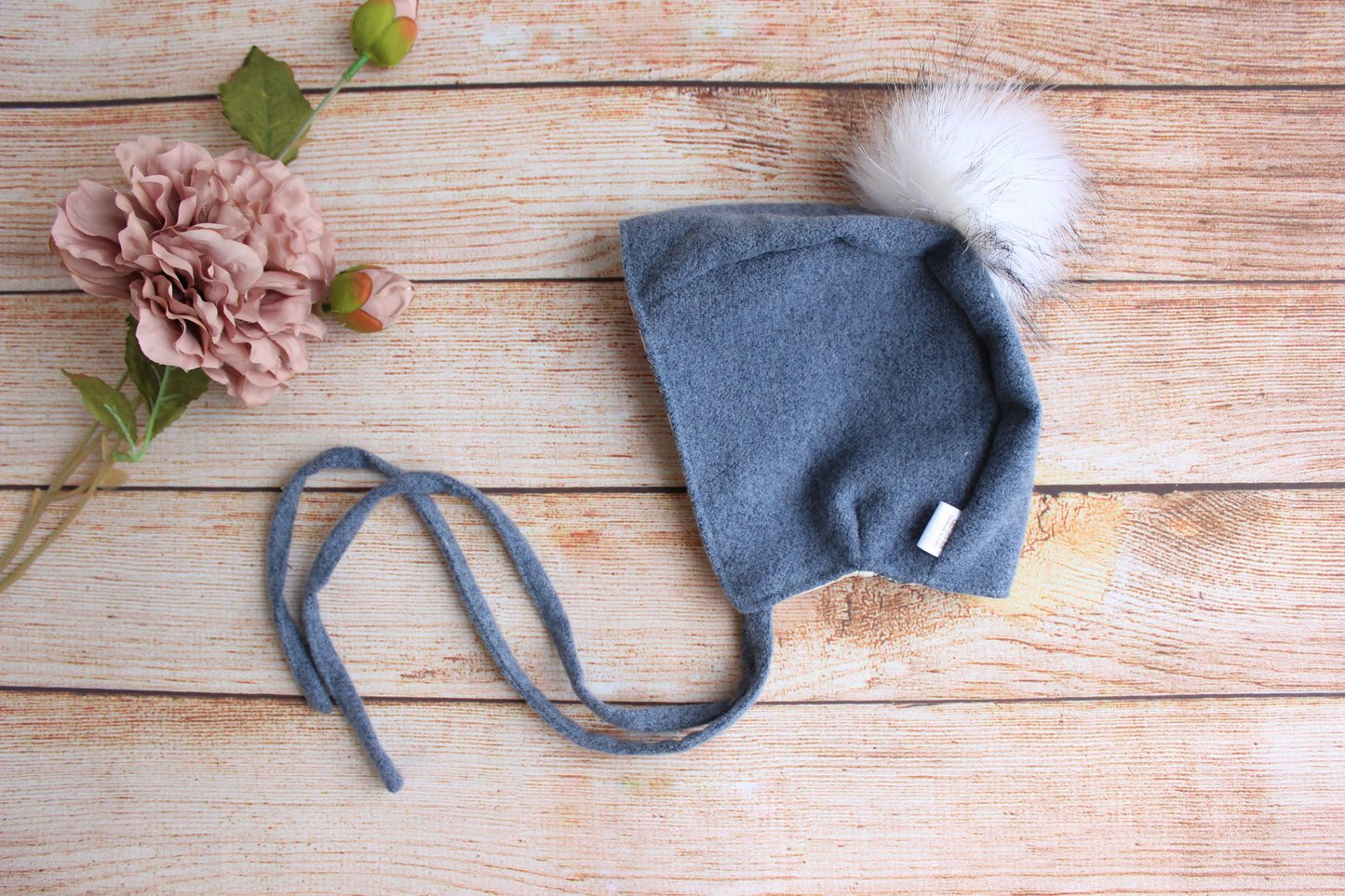 Wool Baby bonnet Blue grey with a white pompon