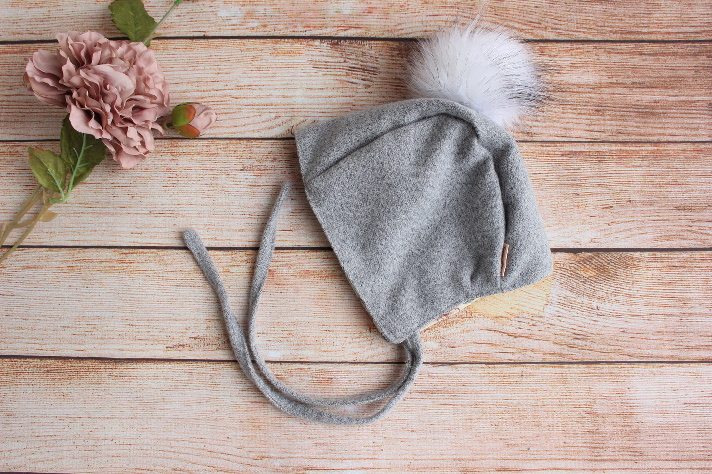 Wool Baby bonnet Light grey with a white pompom