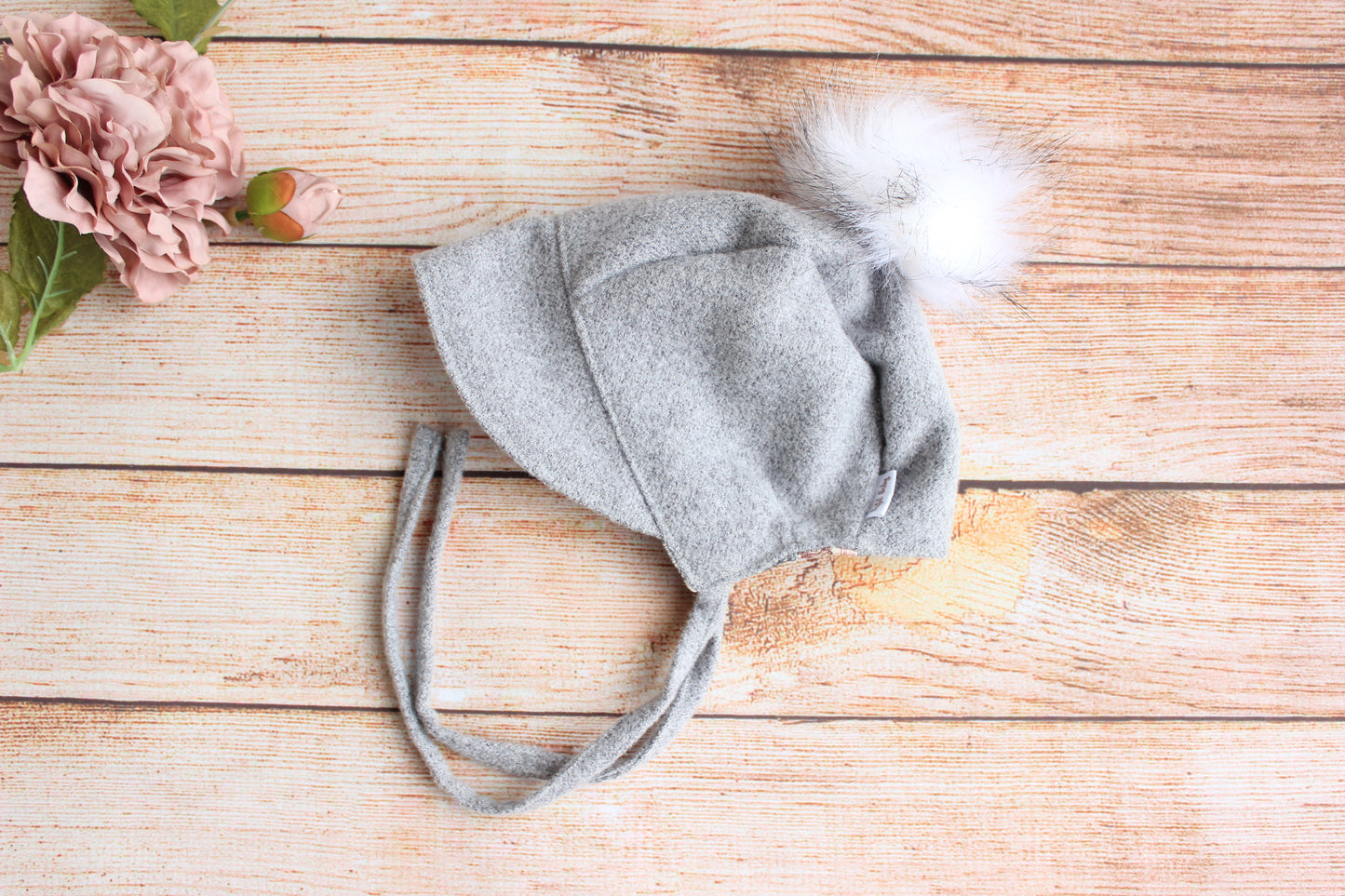 Brimmed Wool Baby bonnet Light grey with a white pompon